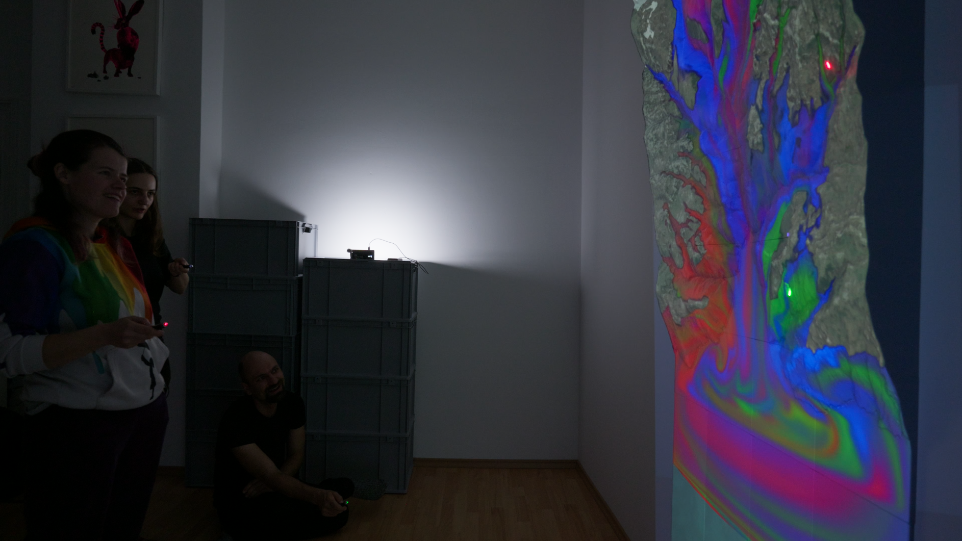 Multiple visitors interacting with the installation